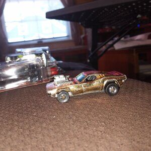 1977 Hot Wheels Gold Chrome Rodger Dodger Blackwall tires.